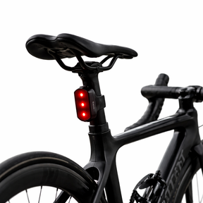 Red rear bike light with three LED points