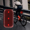 Red rear bike light with three LED points