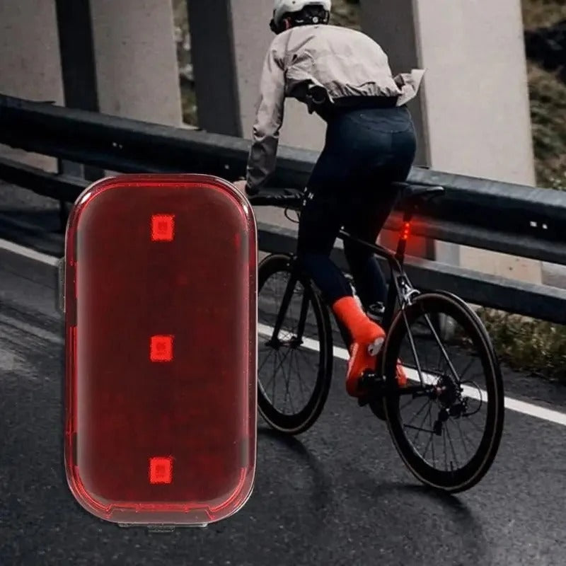 Red rear bike light with three LED points