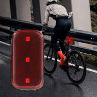 Red rear bike light with three LED points