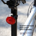 Black round bike rear reflector light with seatpost mount