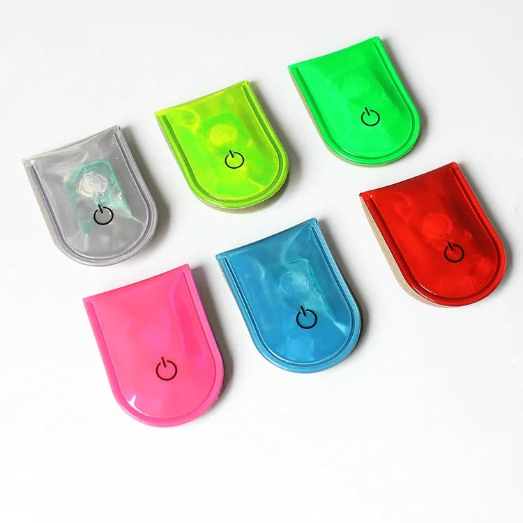 Clip-on bike safety light in multiple colors with flexible strap