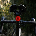 Black round bike rear reflector light with seatpost mount