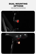 Black round bike light with red lens and hook mount