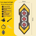 Black bike rear light with red, yellow and green lenses