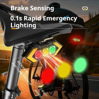 Black bike rear light with red, yellow and green lenses