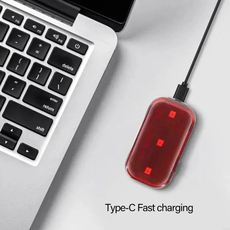 Red rear bike light with three LED points