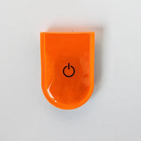 Clip-on bike safety light in multiple colors with flexible strap