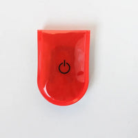 Clip-on bike safety light in multiple colors with flexible strap